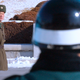 A North Korean soldier watches South Korean soldiers on January 29, 2003, as he stands at the site of the signing of the 1953 armistice.